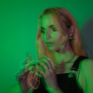Kyla La Grange - While Your Heart's Still Beating album cover