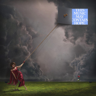 RAYE - THIS MUSIC MAY CONTAIN HOPE. album cover